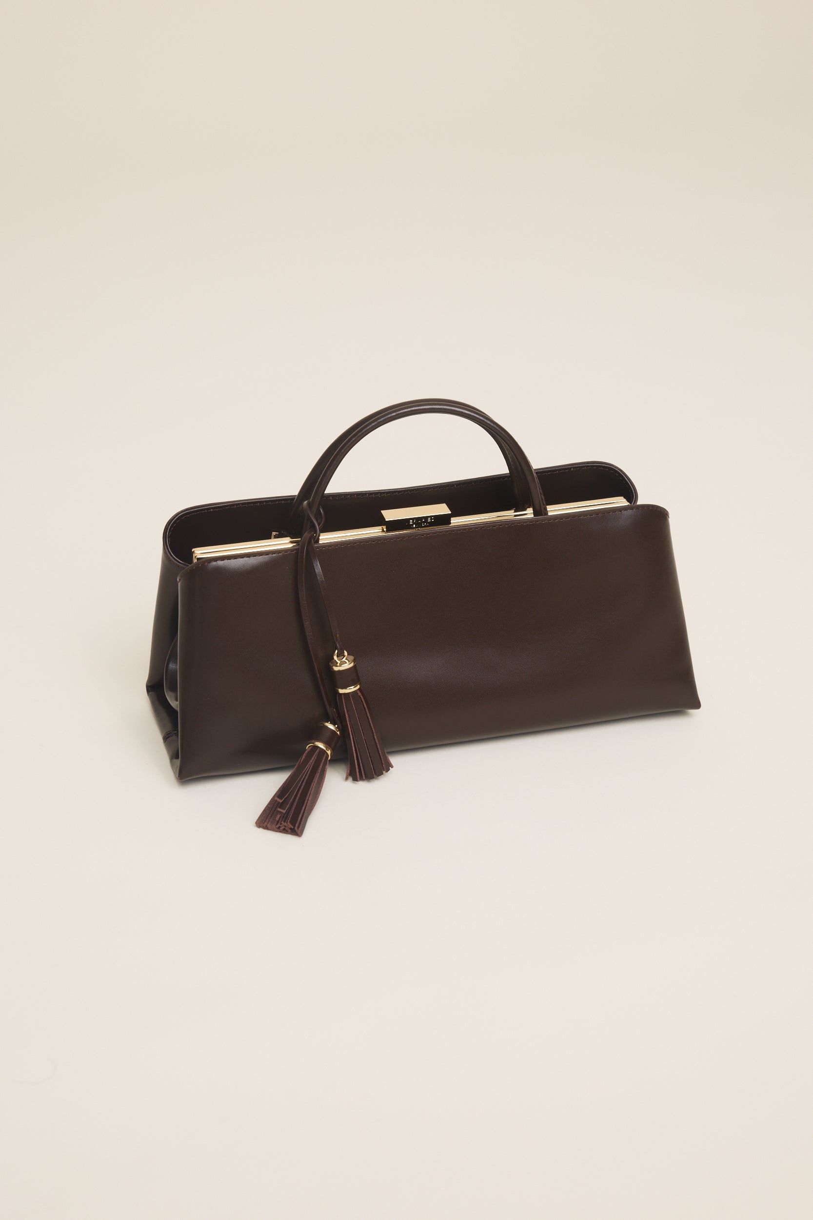 Chocolate Tassel Charm