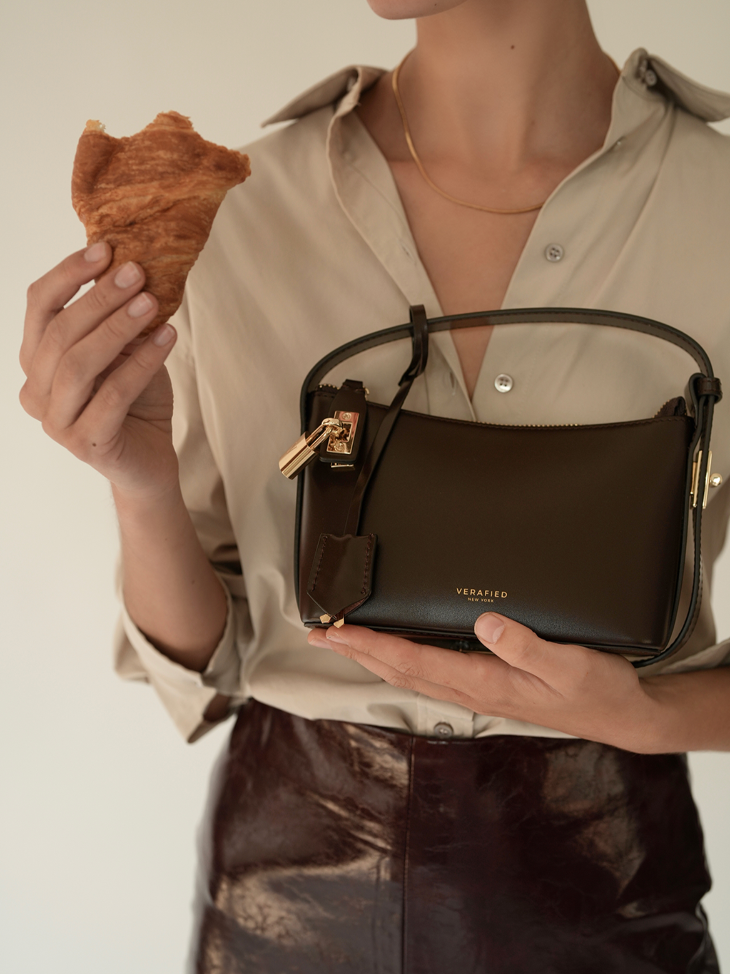 Mini Gold Chocolate Hobo Shoulder Handbag with a model