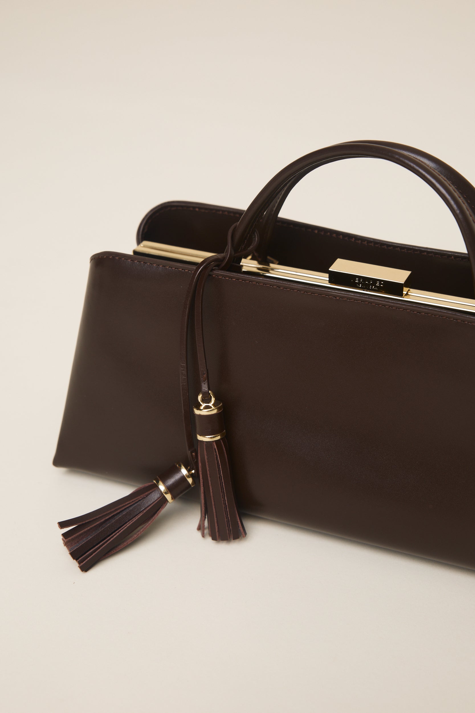 Chocolate Tassel Charm