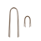 Two metal stakes with curved tops on a white background