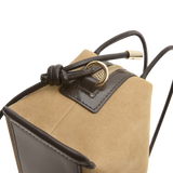 Close-up of a Verafied New York Gold Suede Café Mini Handbag with a brown handle and gold clasp on a white background