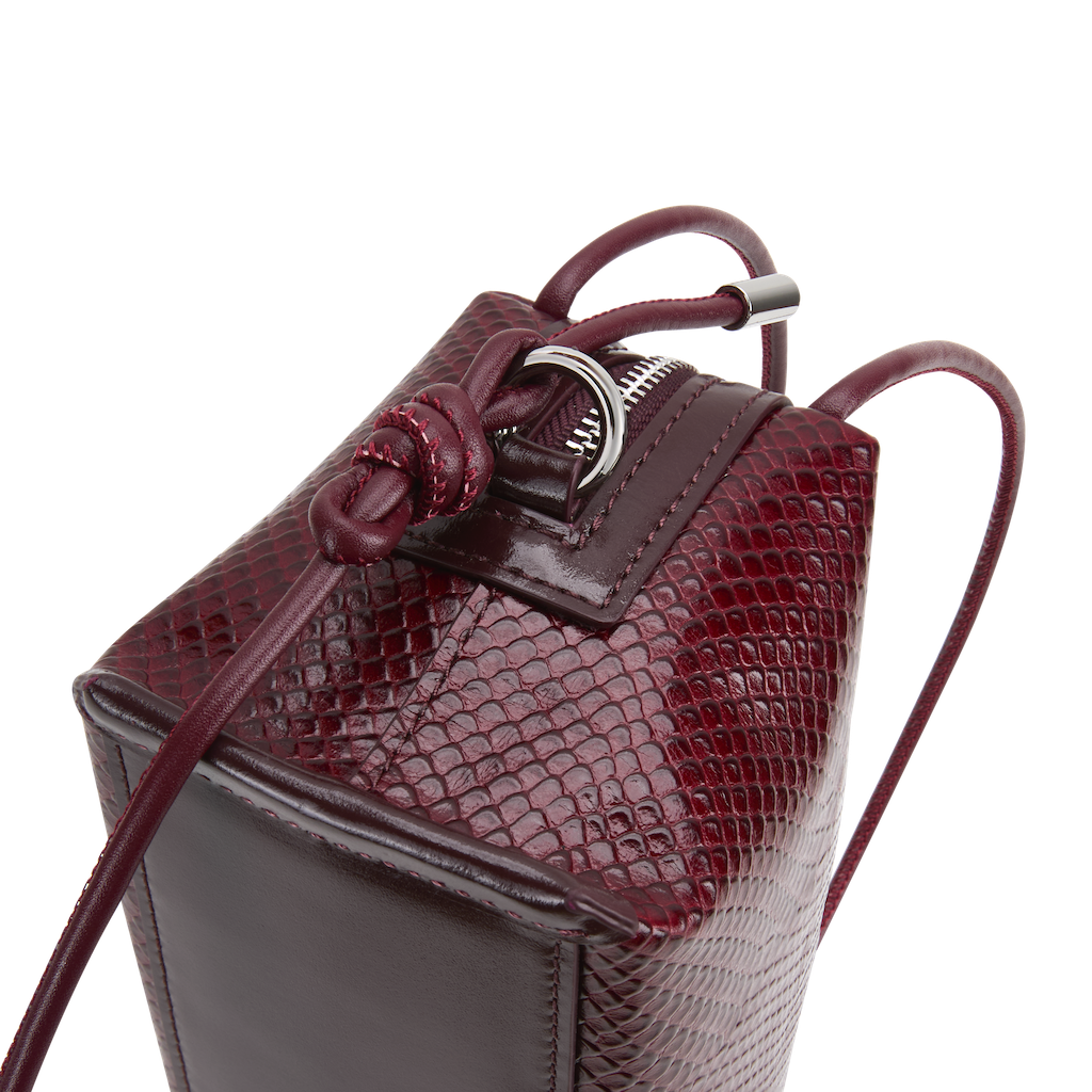 Maroon Python Café Mini Bag: Crossbody Handbag with a strap on a white background