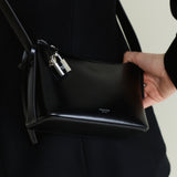 Person holding a Mini Silver Black Hobo Shoulder Handbag with a visible brand name.