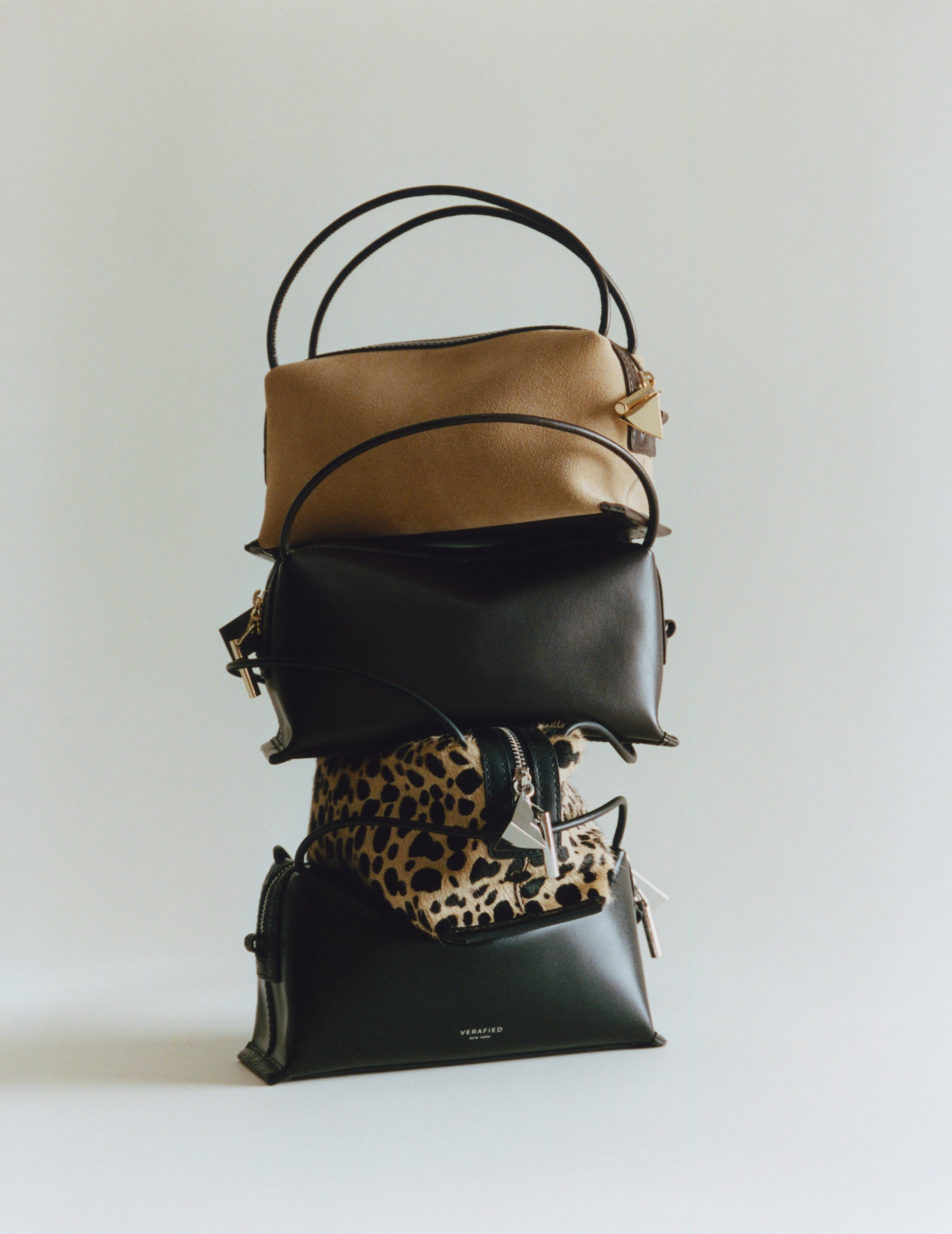 A group of mini crossbody handbags