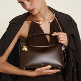 Gold Chocolate Hobo Shoulder Handbag with a Model