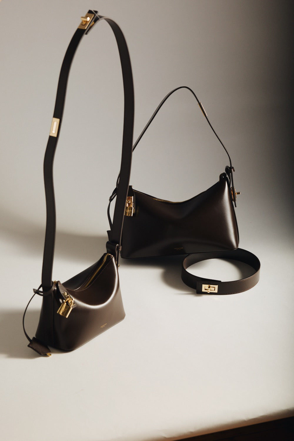 Two Gold Chocolate Hobo Shoulder Handbags